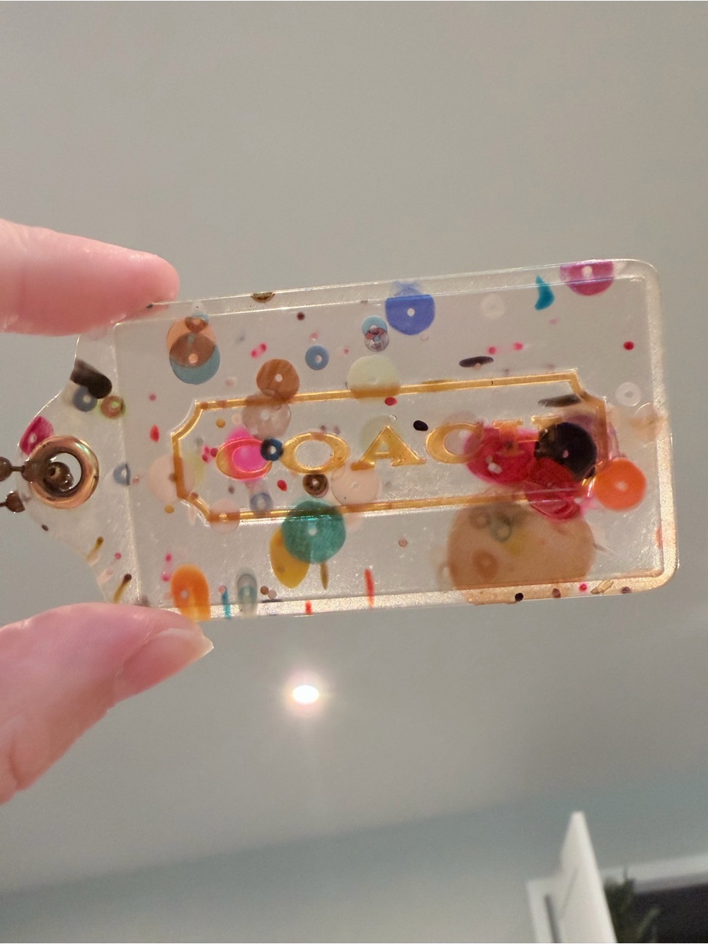 Coach Clear Acrylic Tag with Multicolor Confetti and Gold Logo